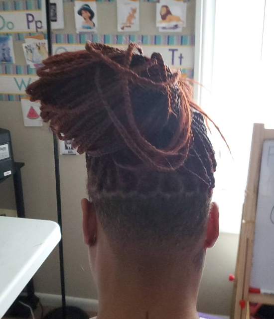 Braided updo with shaved taper