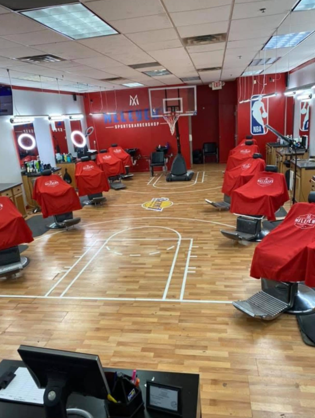 Inside Meleyen's Sports Barbershop — barber chairs set up on a hardwood basketball court.