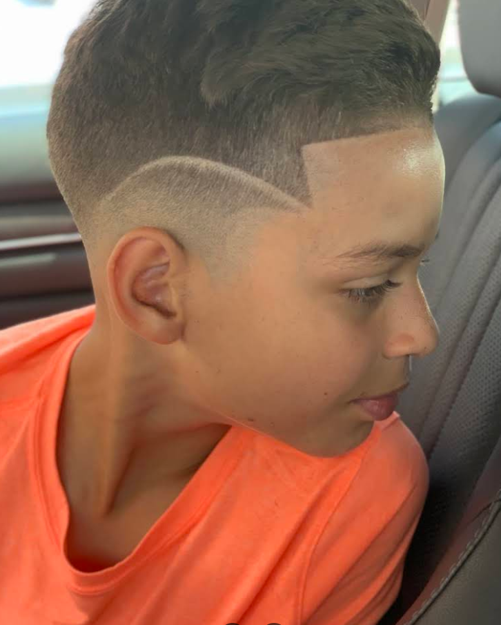High taper fade with custom design